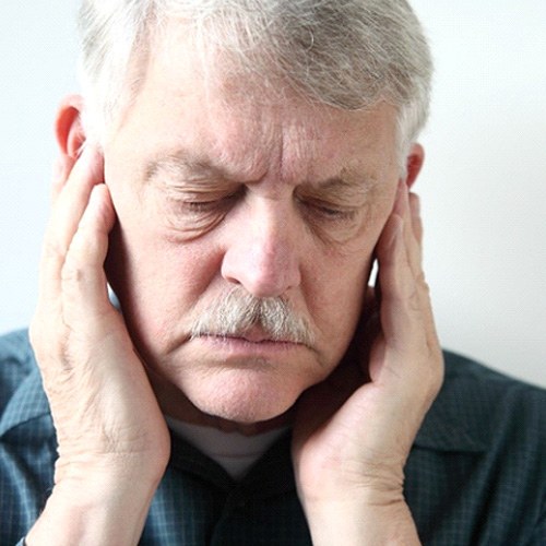 Older man with facial pain